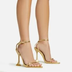 EGO Crew Ankle Strap Pointed Toe Statement Heel In Gold Faux Leather