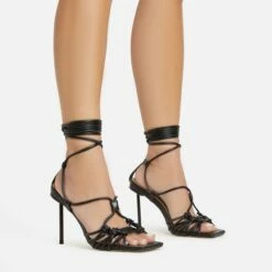 EGO Tour Lace Up Knotted Strap Cage Detail Square Toe Thin Stiletto Heel In Black Faux Leather