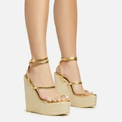 EGO Arred Clear Perspex Strap Detail Woven Platform Wedge In Gold Faux Leather