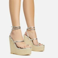 EGO Arred Clear Perspex Strap Detail Woven Platform Wedge In Silver Faux Leather