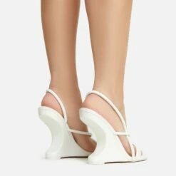 EGO Thriller Strappy Detail Square Toe Sling Back Cut Out Wedge Heel In White Faux Leather -EGO Sales Store 30 11 22 fw39903 sb2
